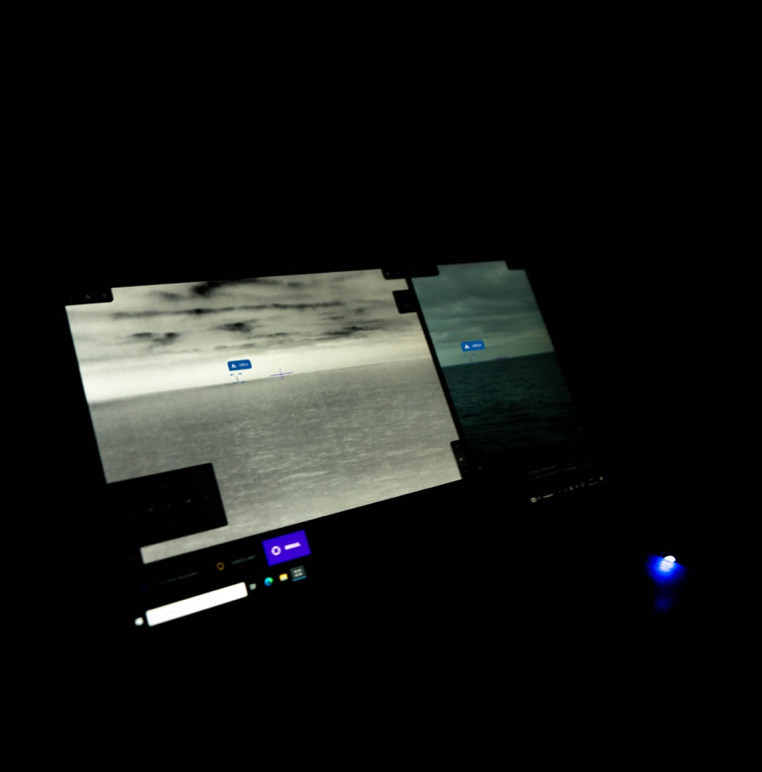 SEA.AI display highlighting a small floating object detected ahead of a vessel