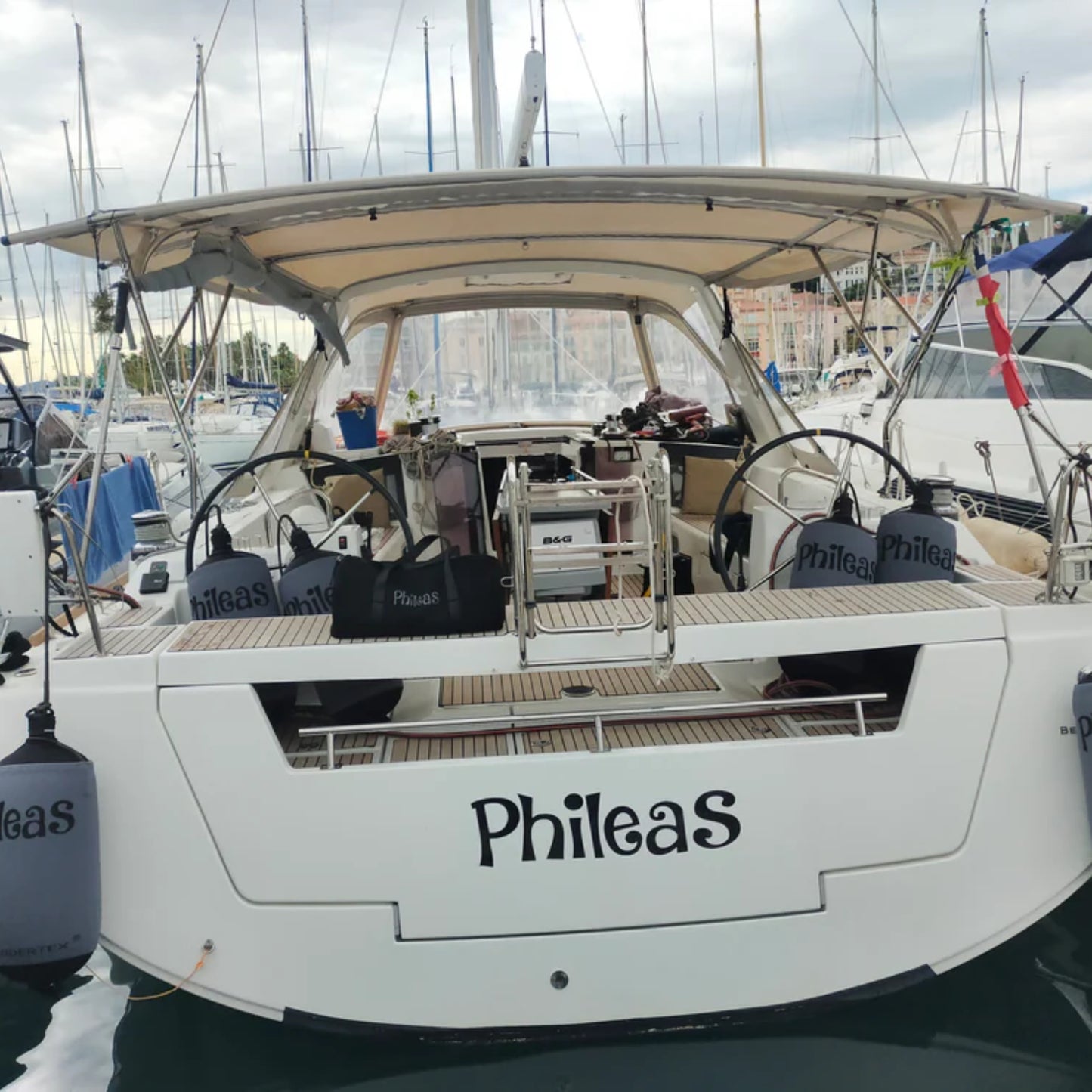 Fendertex textile fenders fitted on a sailing yacht named Phileas moored in a marina