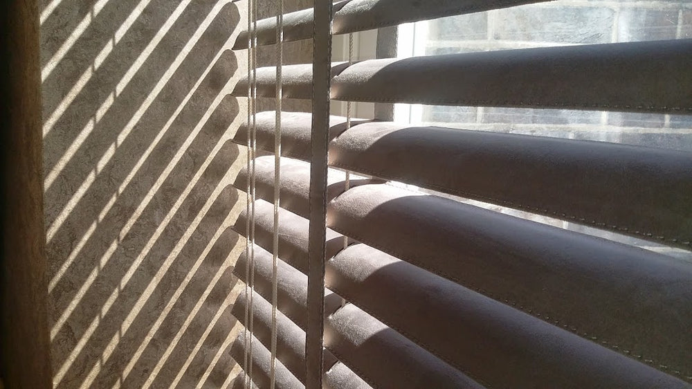 La Nautica faux-nabuk Venetian blinds filtering sunlight